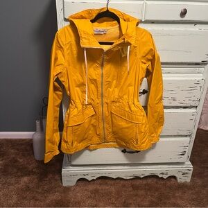 Athleta Sunburst Yellow Jacket. Rain jacket material, size XS.